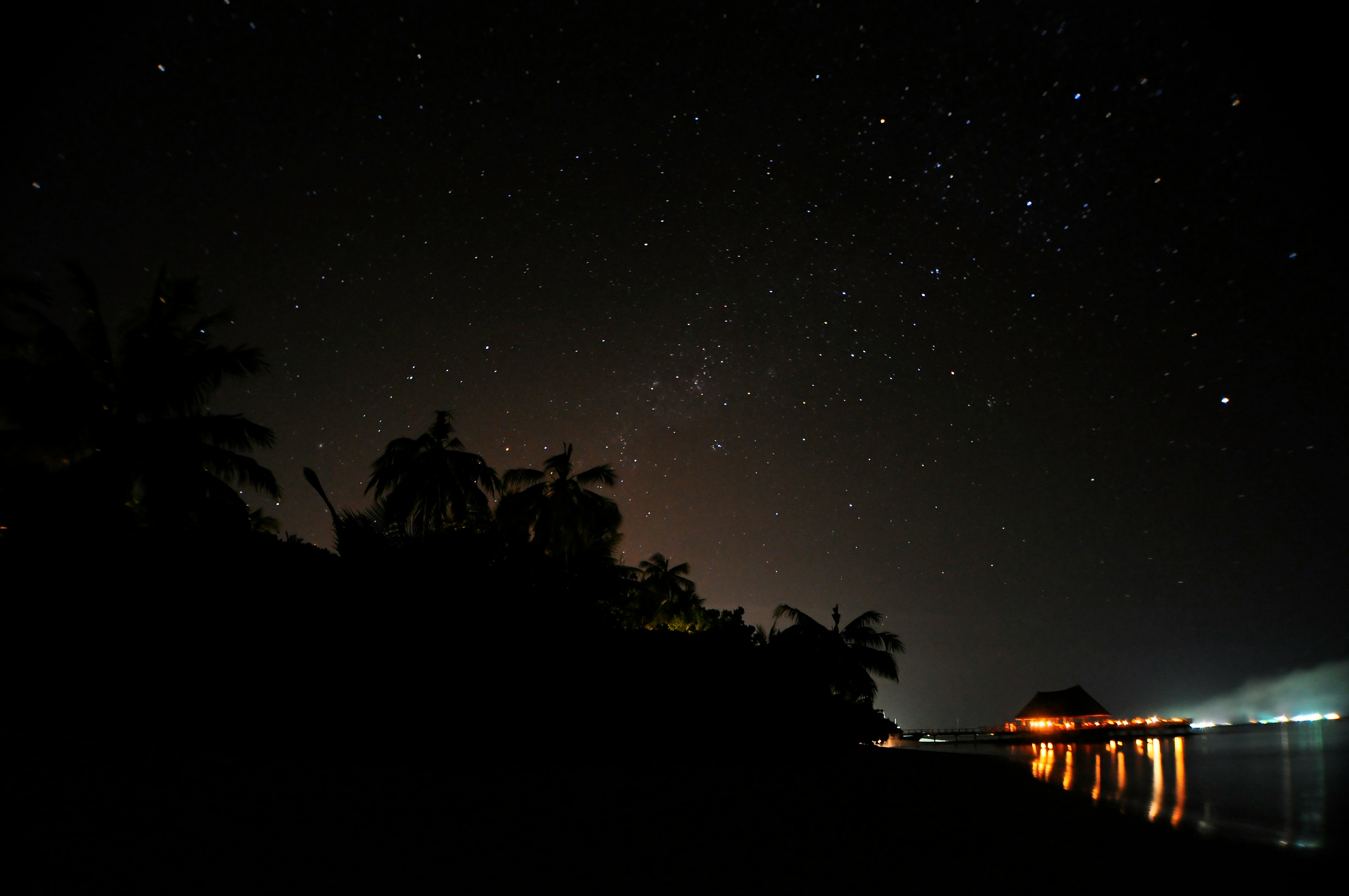 lighted house in island during nighttime